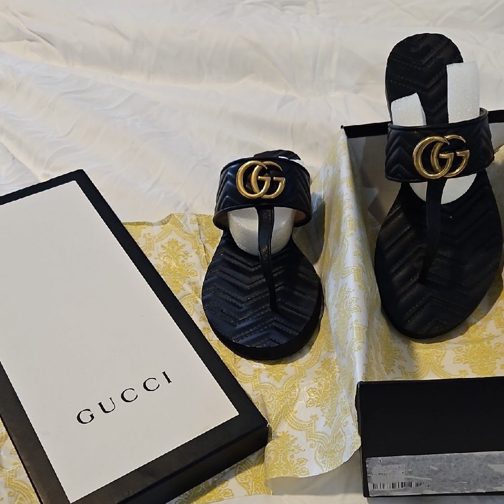 Gucci Black Sandals with Gold Emblem